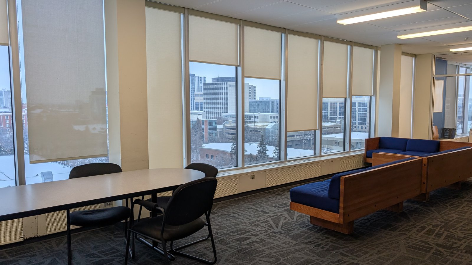 Image of couch and table seating on the sixth floor of SUB